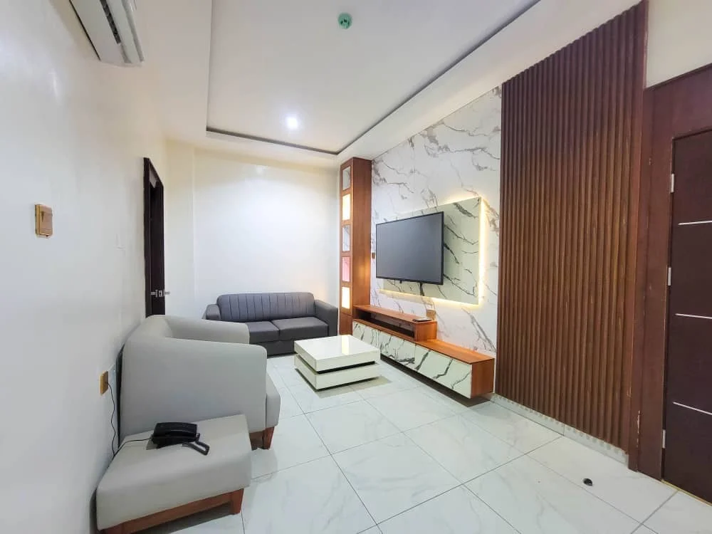 Business Suite bedroom at Fiesto Continental Hotel